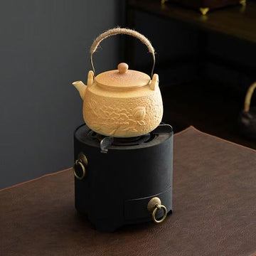 Yellow-carved tea stove