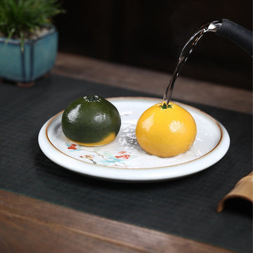 Purple Clay Oranges tea pet