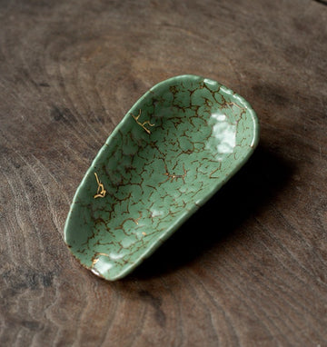 Moss tea scoop