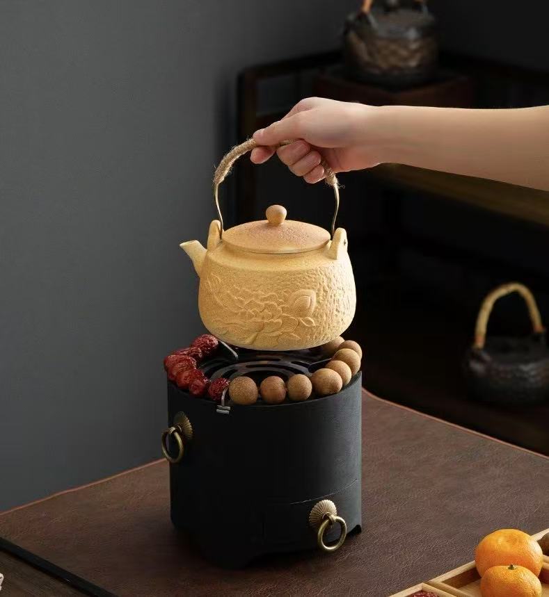Yellow-carved tea stove