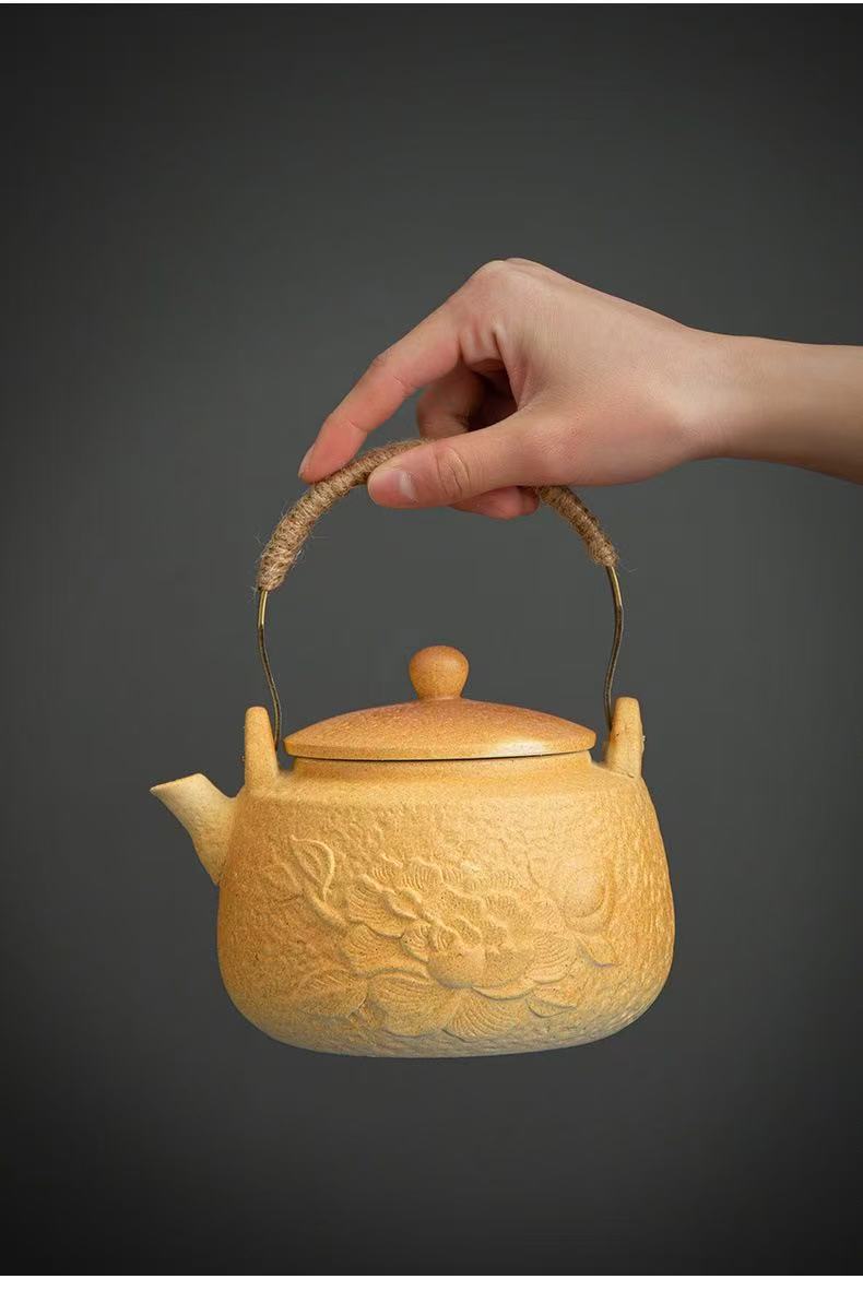 Yellow-carved tea stove