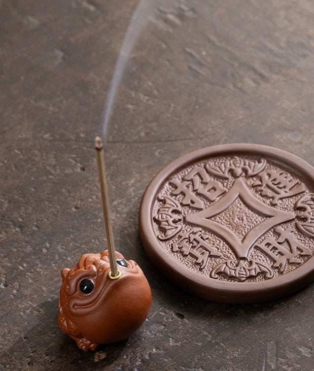 The Proud Golden Toad incense burner