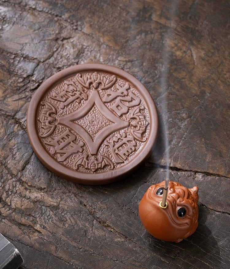 The Proud Golden Toad incense burner