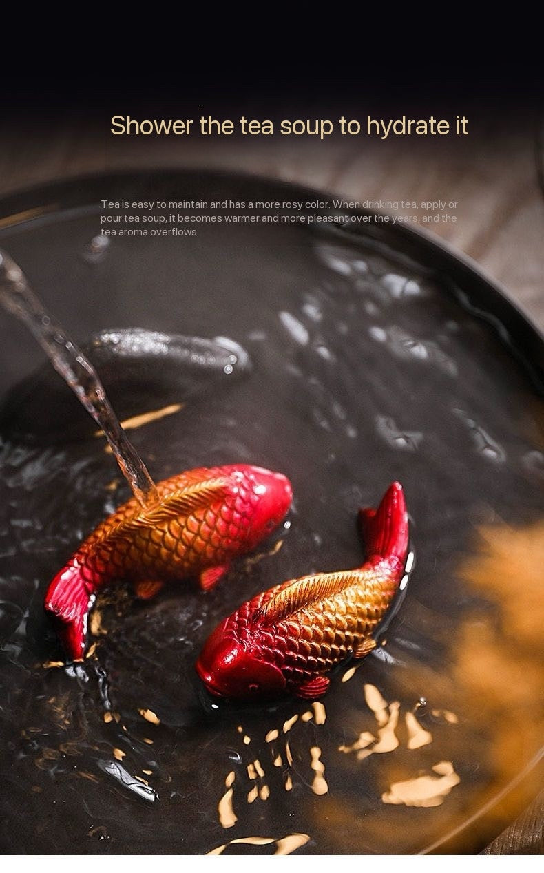 Carp teapet