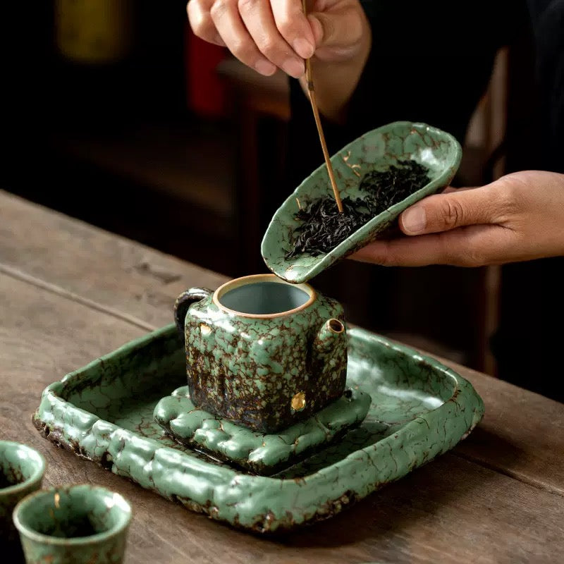 Moss tea scoop